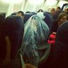 Photo: Orthodox Jewish Man Covers Himself In Plastic Bag On Plane